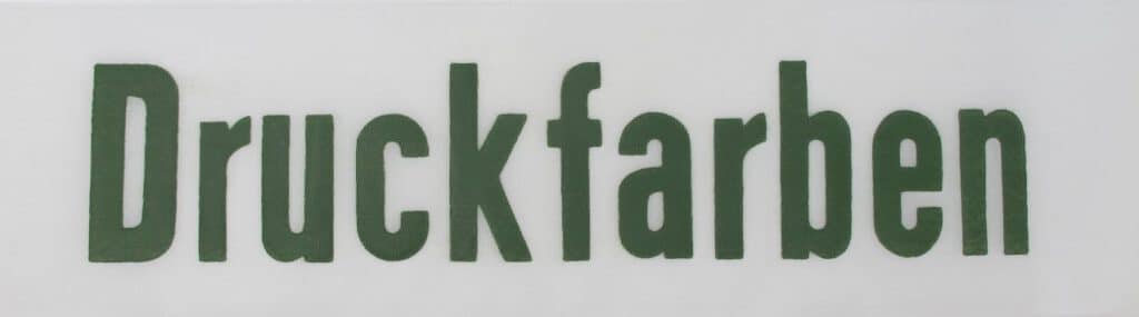 Druckfarben in dunkelgrün.