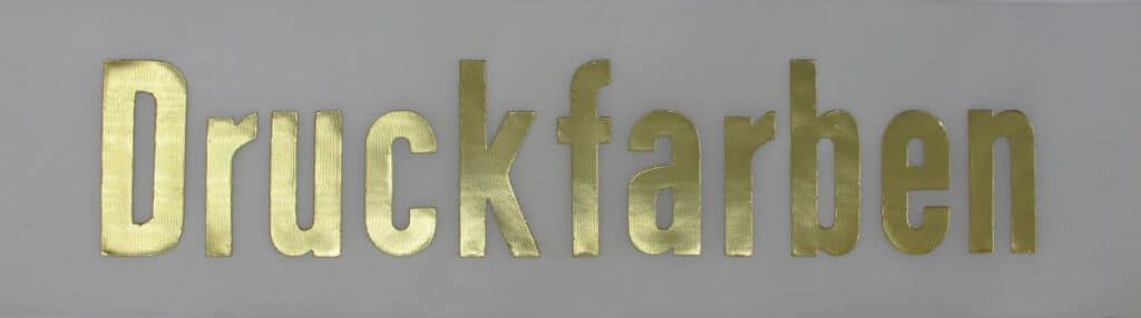 Druckfarben in Gold-matt.